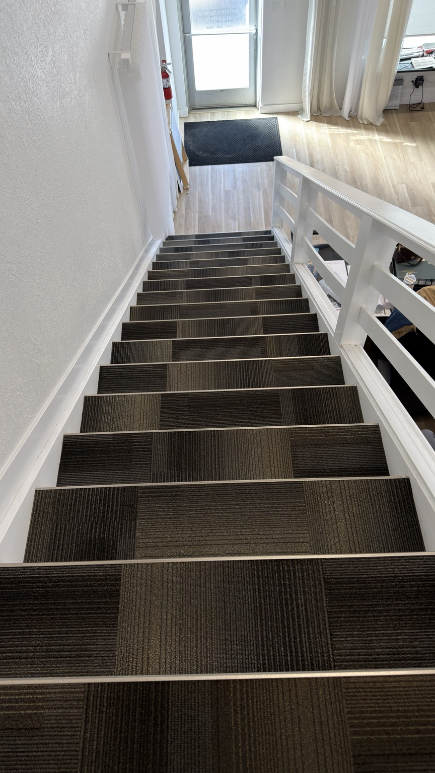 Commercial carpeted stairs after cleaning