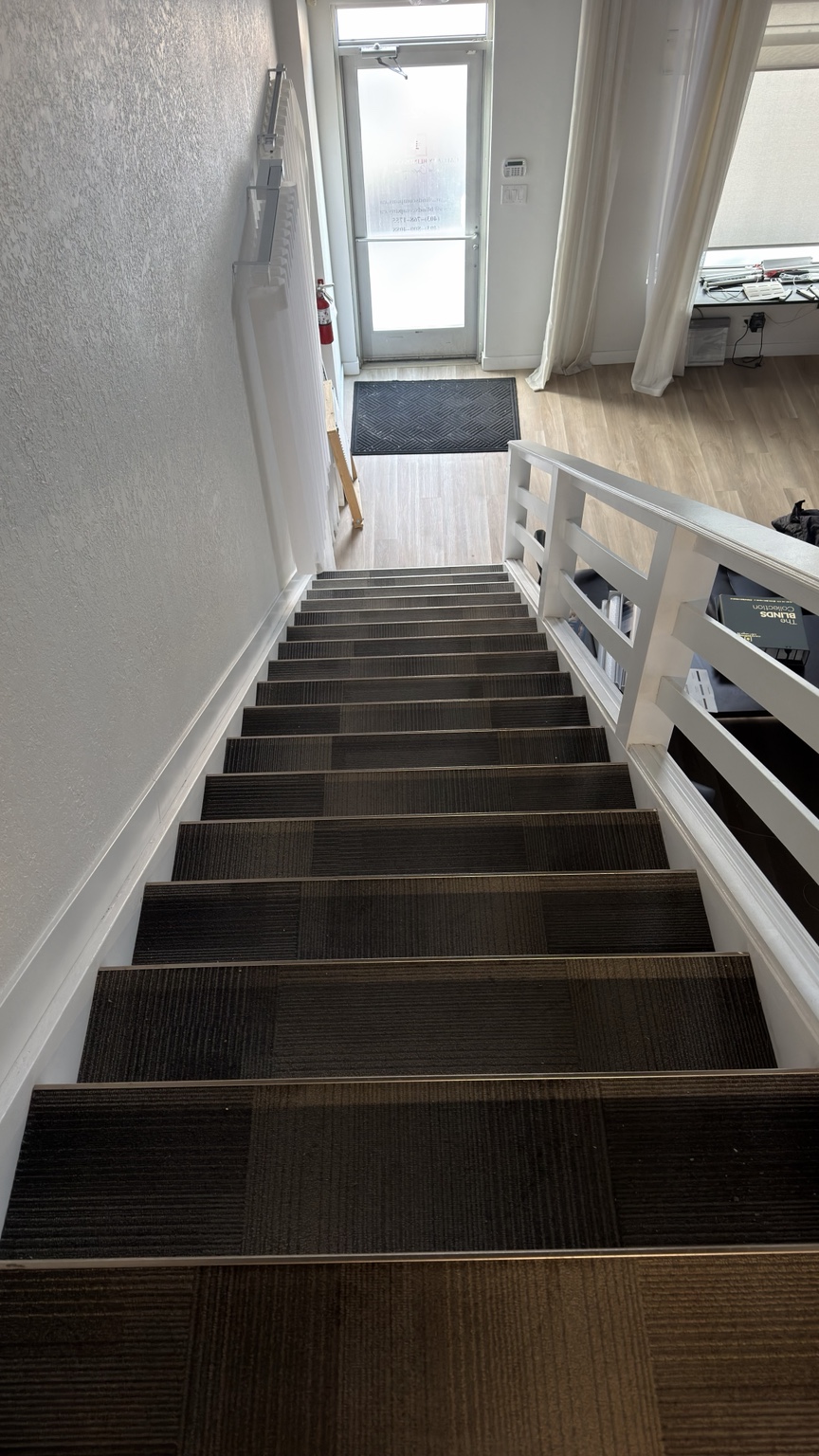 Commercial carpeted stairs before cleaning